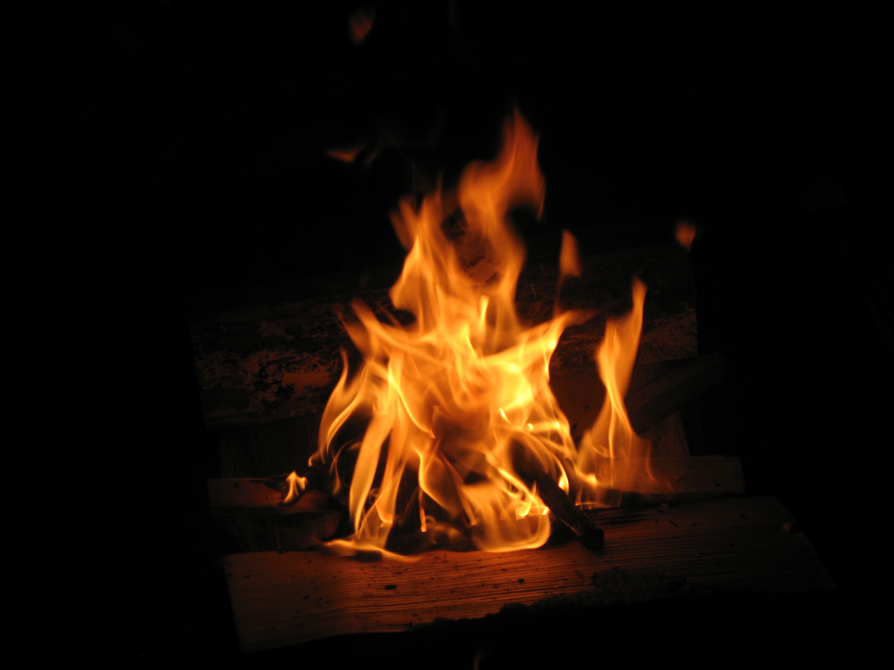 A bonfire burning bright against the night.